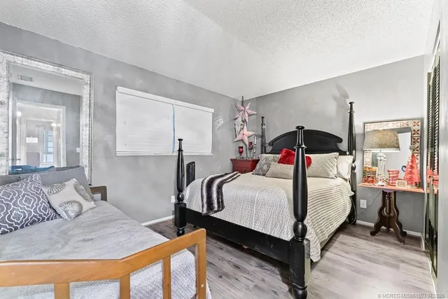 a view of a swimming pool with a patio