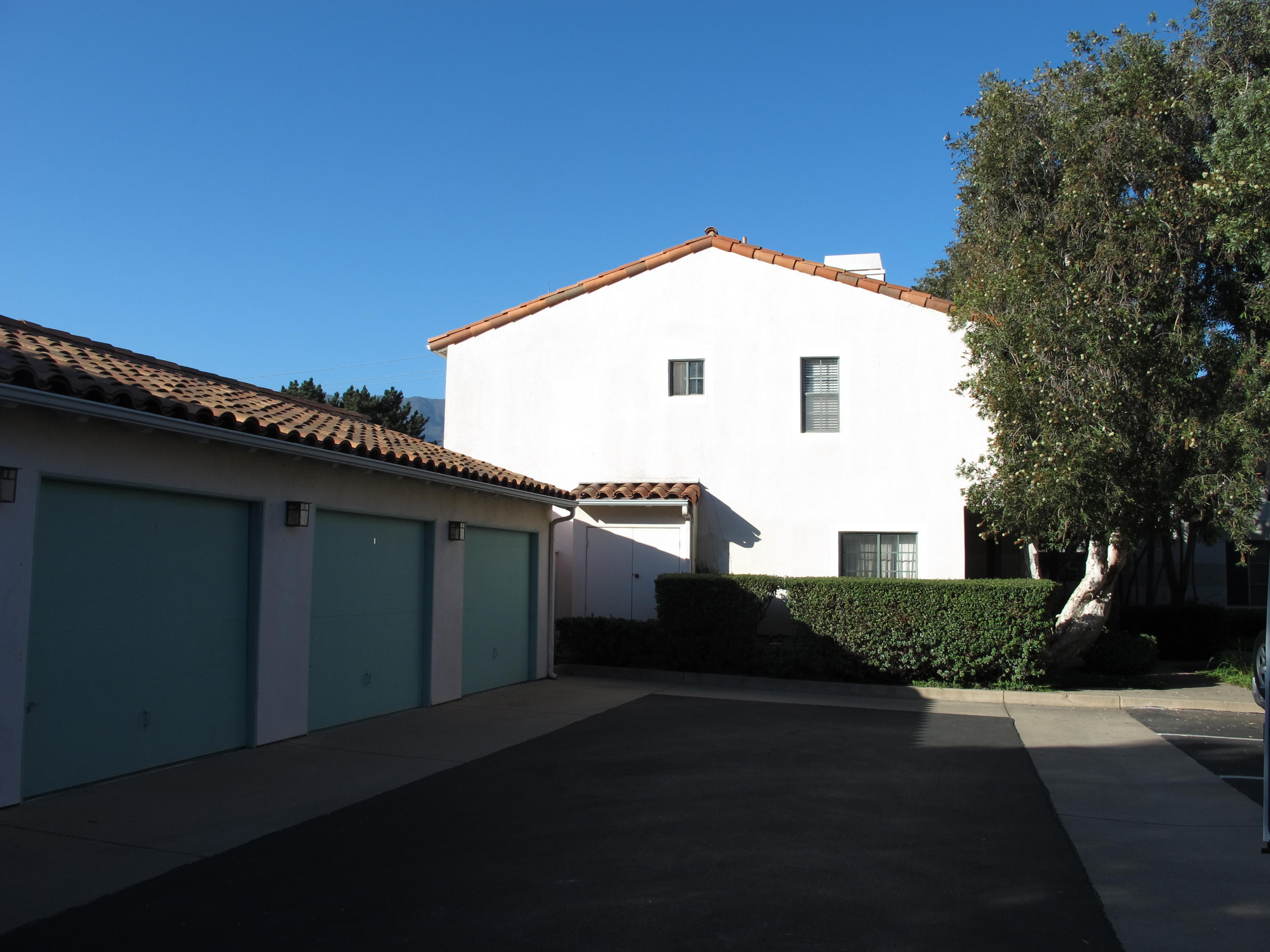 4297 Carpinteria Avenue, Unit 13 Carpinteria, CA 93013 - Photo 15 of 17 a view of a house with a street