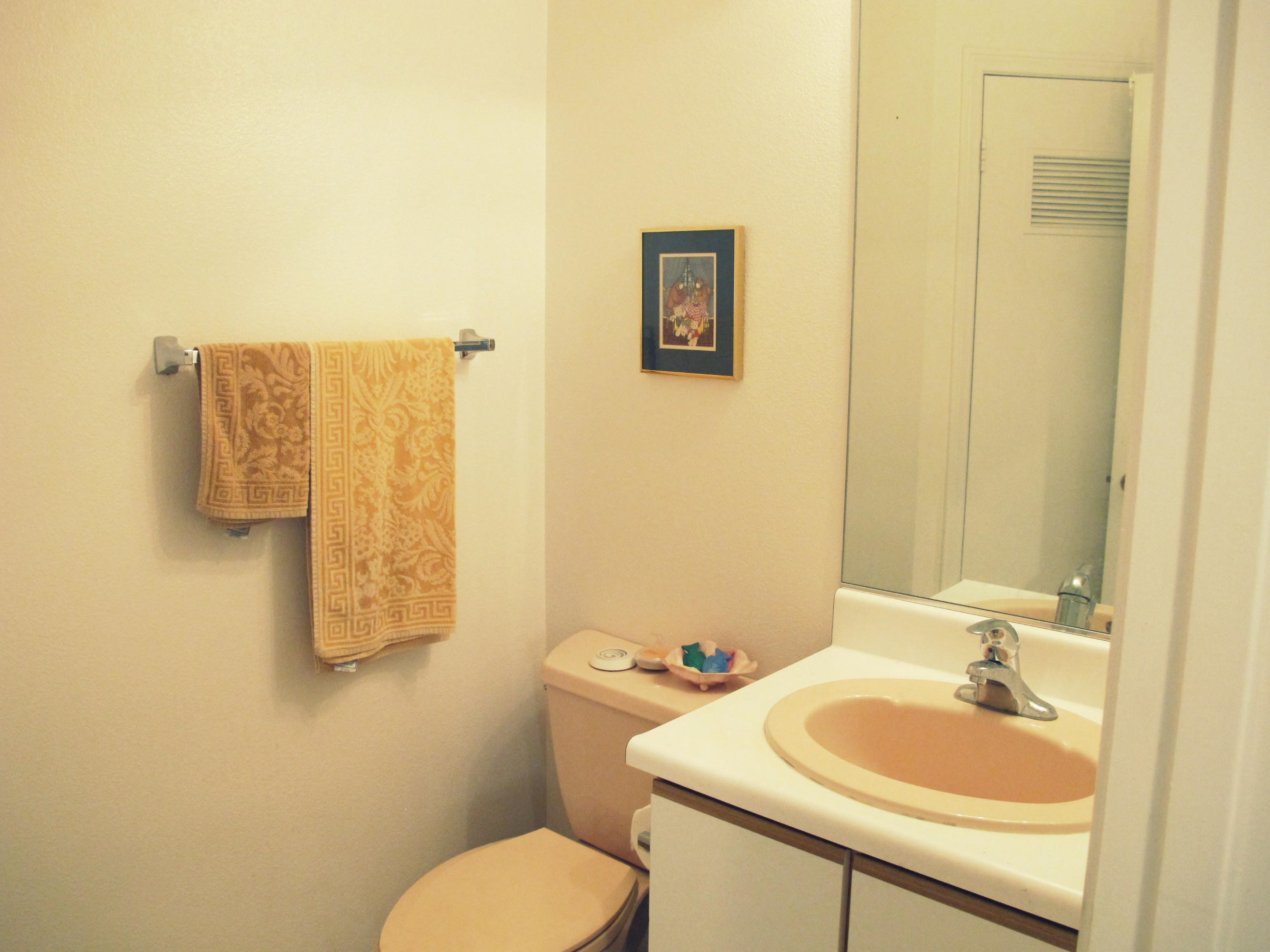 4297 Carpinteria Avenue, Unit 13 Carpinteria, CA 93013 - Photo 10 of 17 a bathroom with a sink and a toilet