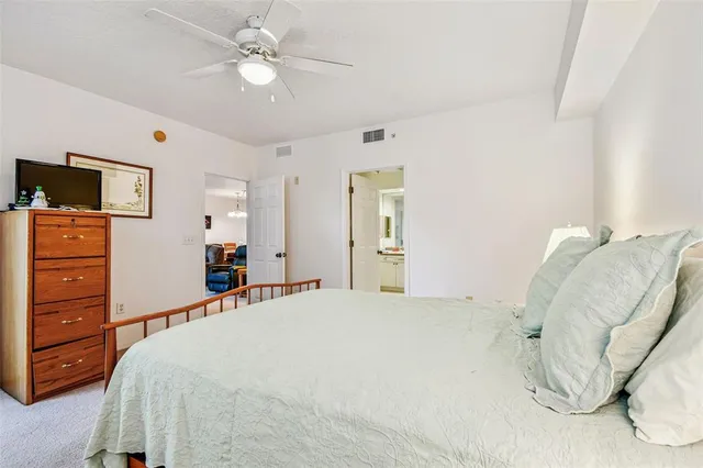 a bathroom with a granite countertop sink double and mirror