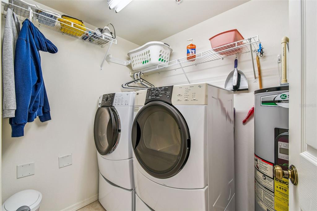 960 Starkey Road, Unit 2203 Largo, FL 33771 - Photo 33 of 53 a utility room with dryer and washer