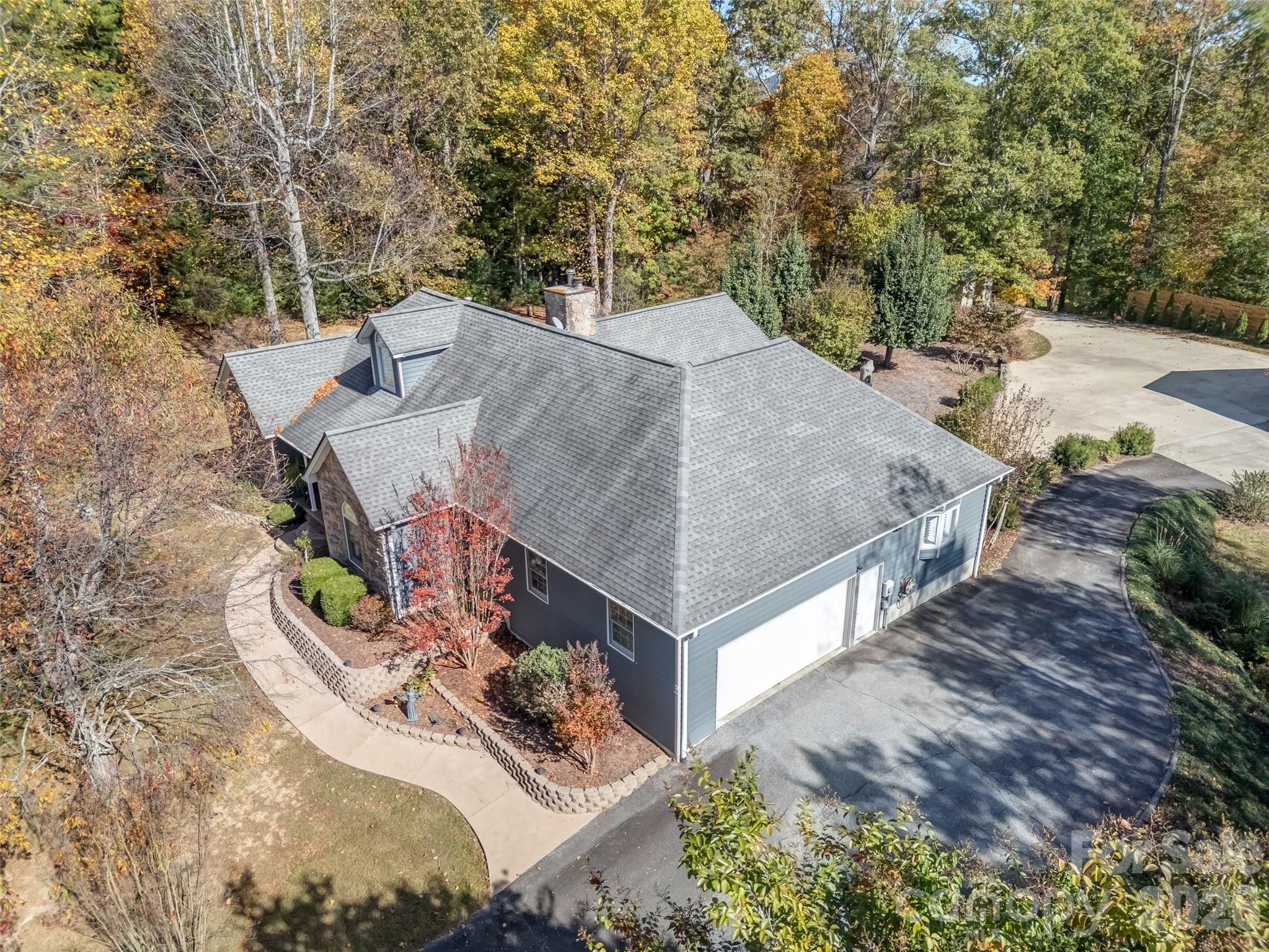 1340 Macedonia Road Saluda, NC 28773 - Photo 45 of 45 an aerial view of a house with outdoor space