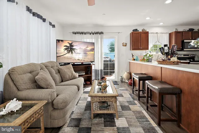a kitchen with a sink stove and microwave