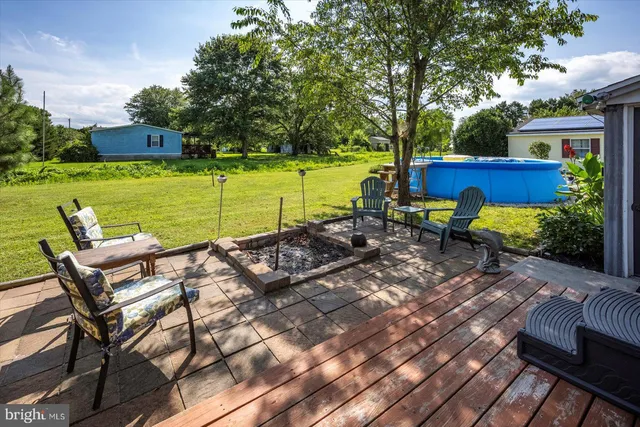 a view of a house with a back yard