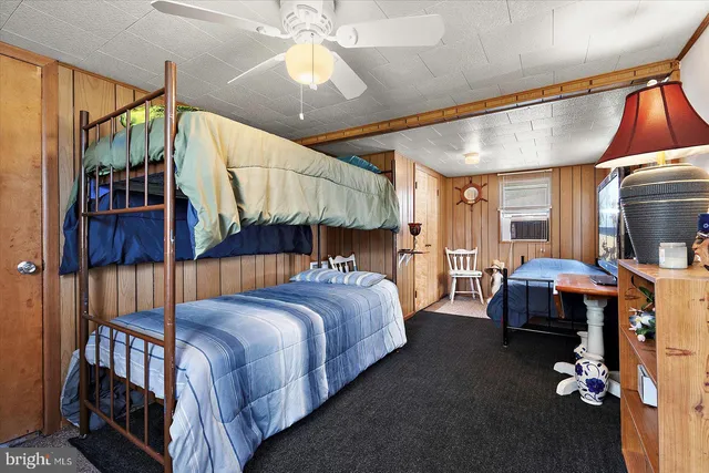 a kitchen with stainless steel appliances a sink counter space and a refrigerator