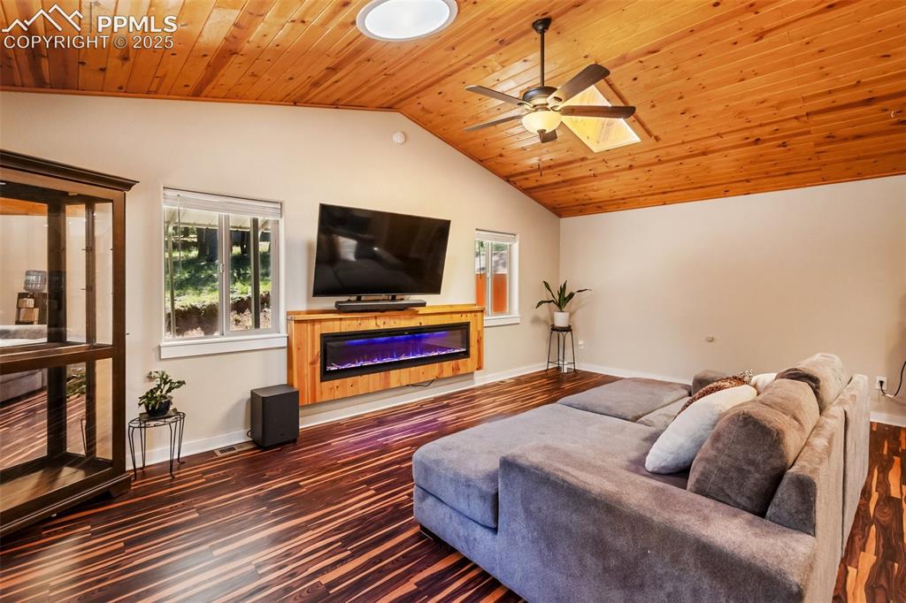 234 Wahsatch Road Florissant, CO 80816 - Photo 10 of 44 Knotty pine tongue and groove ceilings, and laminate flooring