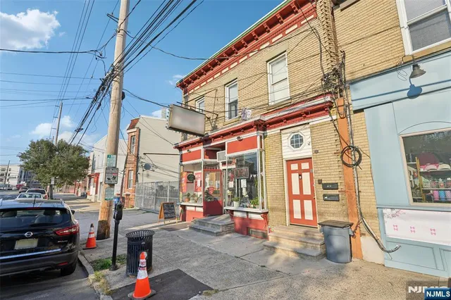 a view of a building with sitting area