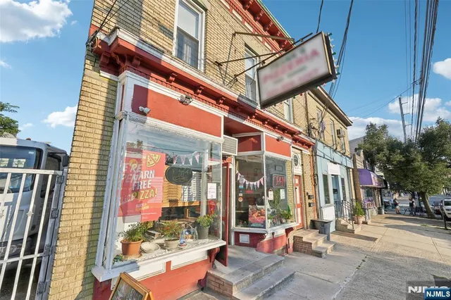a view of a building with a street