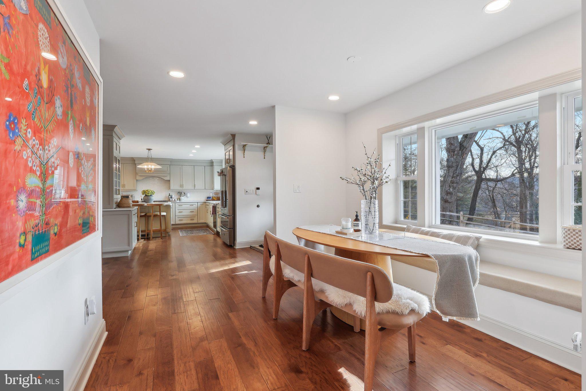 206 Upper Gulph Road Radnor, PA 19087 - Photo 13 of 36 a dining hall with stainless steel appliances granite countertop a living room dining room and wooden floor