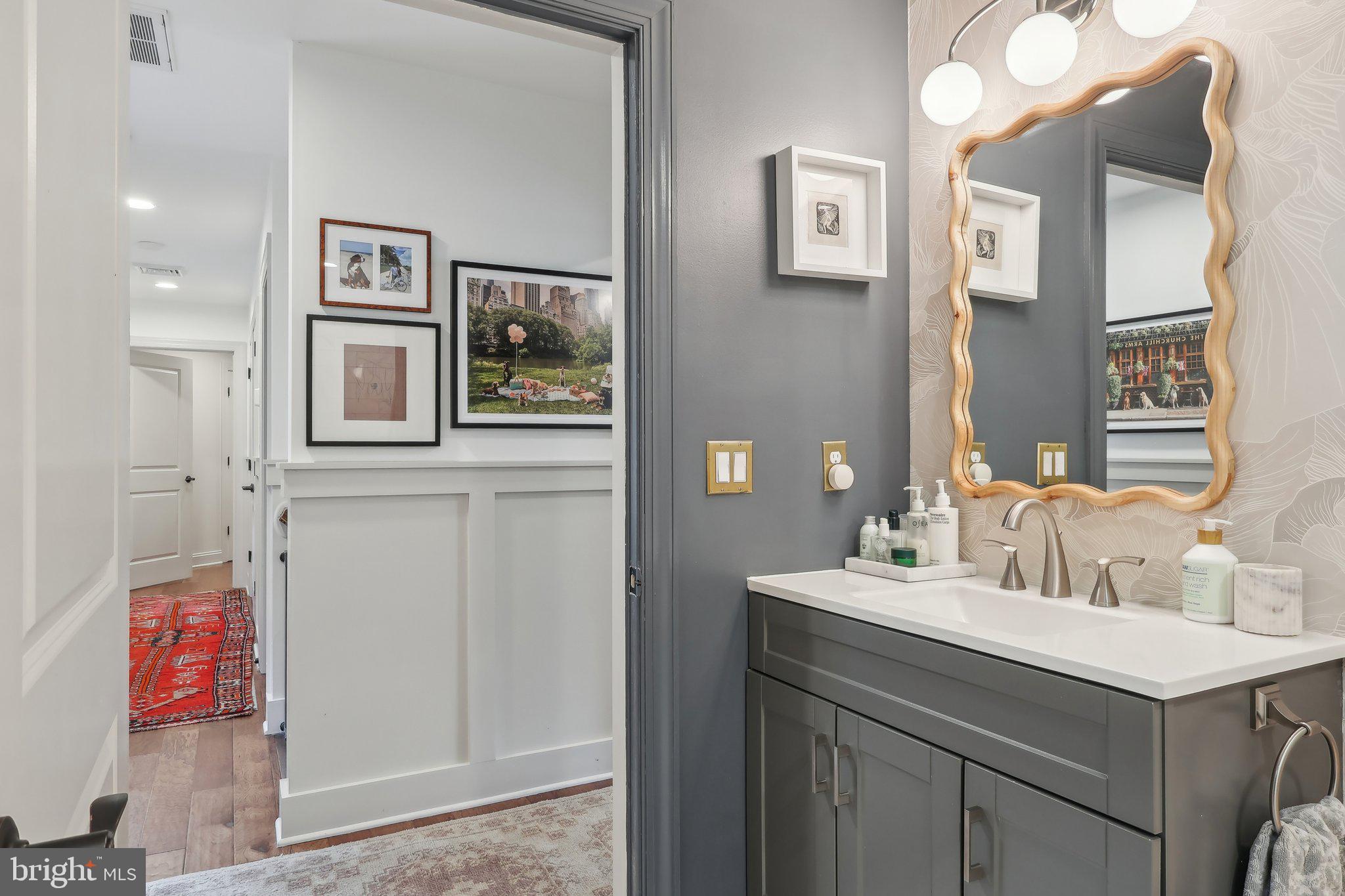 206 Upper Gulph Road Radnor, PA 19087 - Photo 29 of 36 a bathroom with a sink and a mirror