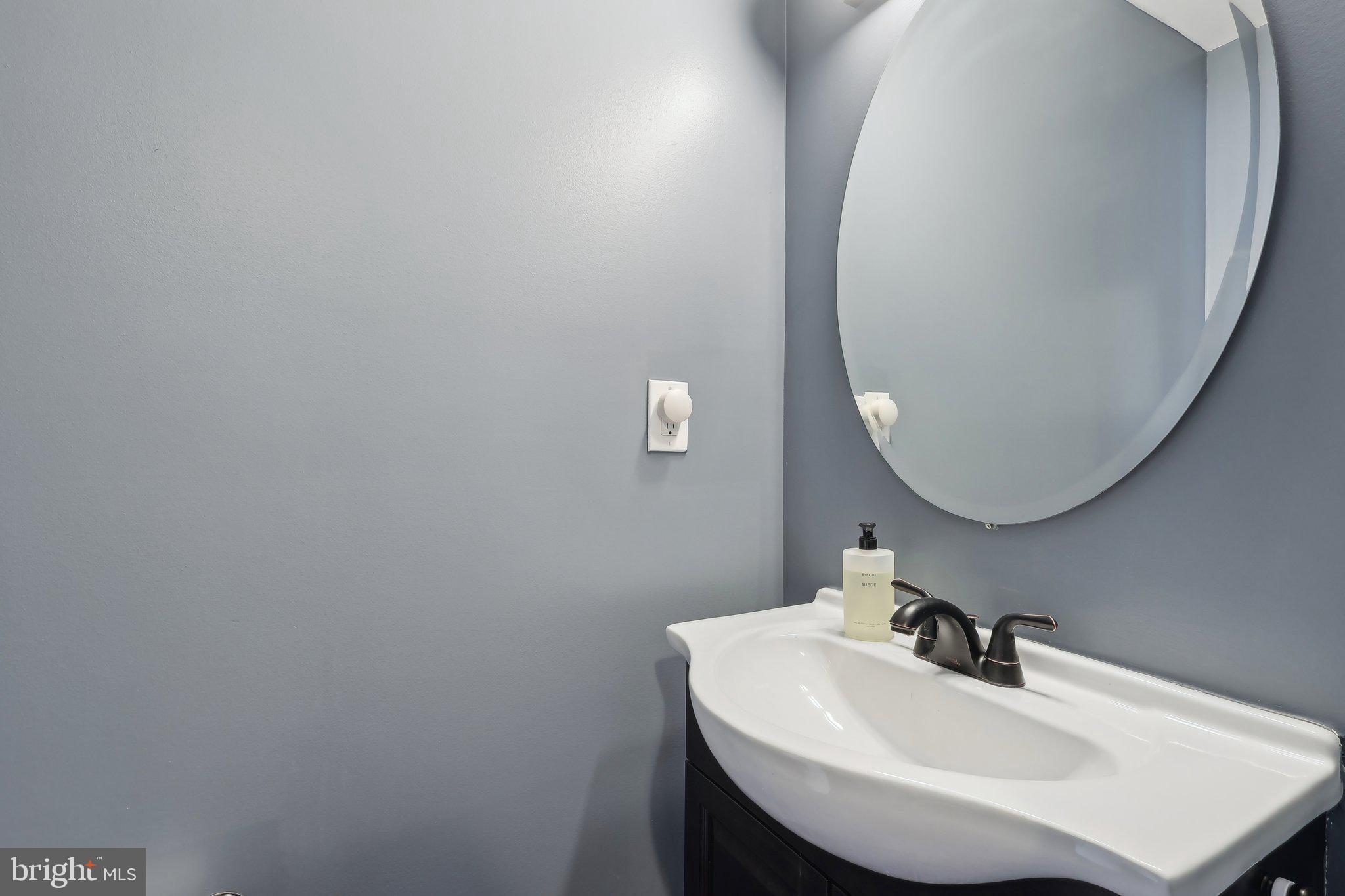 206 Upper Gulph Road Radnor, PA 19087 - Photo 10 of 36 a bathroom with a sink and mirror