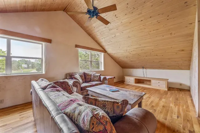a view of livingroom with furniture wooden floor and window