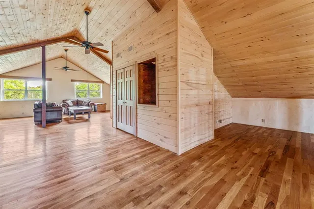 a bathroom with a sink and mirror with toilet