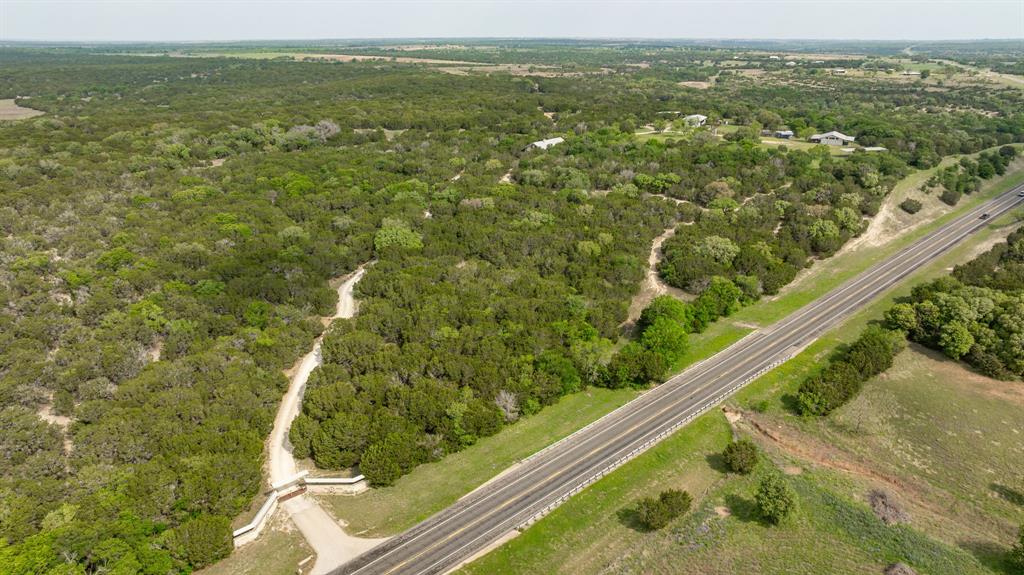 5905 North Us Highway Hamilton, TX 76531 - Photo 2 of 40 a view of a green field with an outdoor space