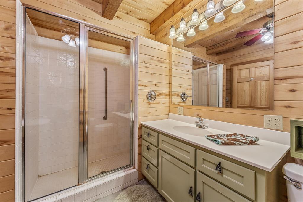 5905 North Us Highway Hamilton, TX 76531 - Photo 22 of 40 a bathroom with a sink and a mirror