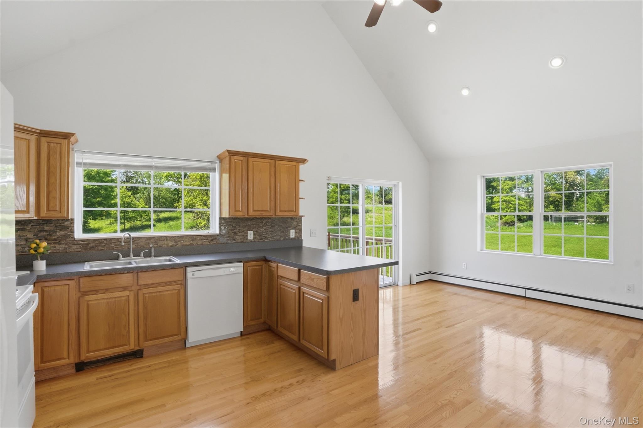 160 Pirog Road Pine Bush, NY 12566 - Photo 16 of 50 a kitchen with stainless steel appliances granite countertop a stove a sink and a large window