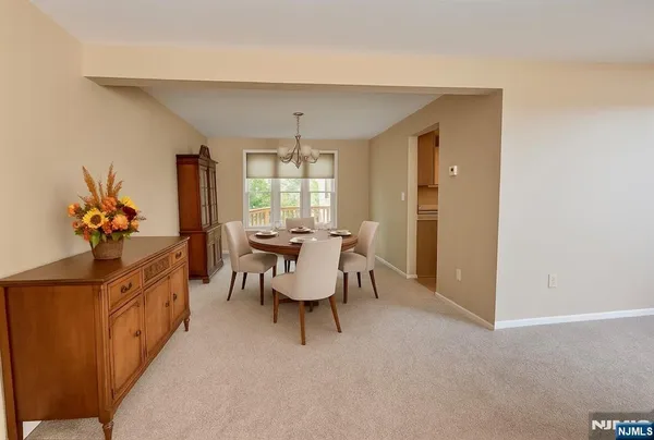 a view of a livingroom with furniture and window