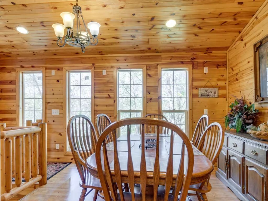 1634 Ridgecrest Drive Sevierville, TN 37876 - Photo 6 of 18 a view of a dining room with furniture wooden floor and chandelier
