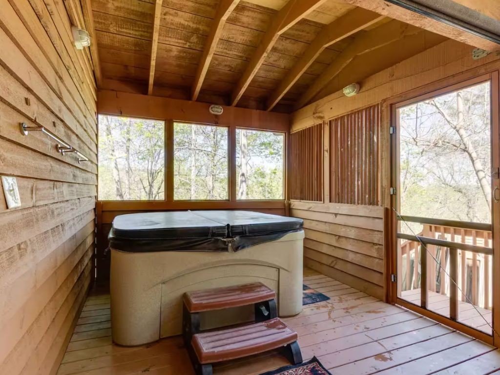 1634 Ridgecrest Drive Sevierville, TN 37876 - Photo 10 of 18 a view of a balcony with furniture and wooden floor
