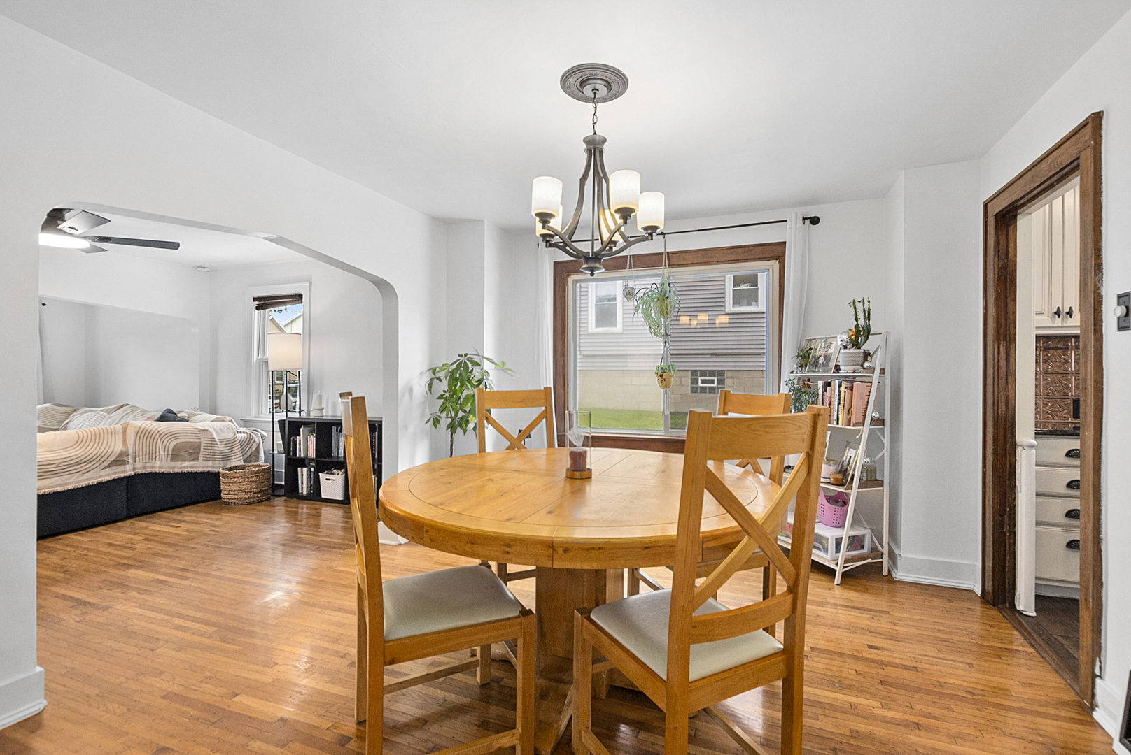 714 Walnut Street Lemont, IL 60439 - Photo 6 of 25 a view of a dining room with furniture and wooden floor