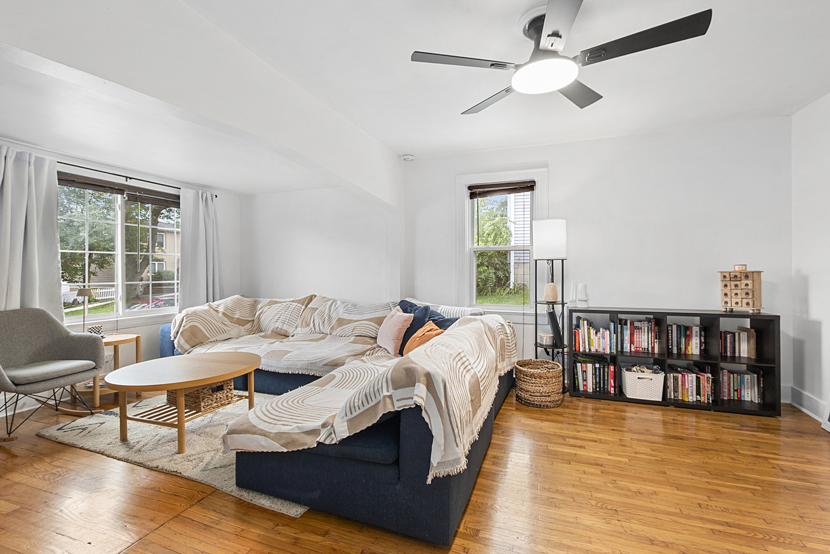 714 Walnut Street Lemont, IL 60439 - Photo 8 of 25 a living room with furniture and a book shelf