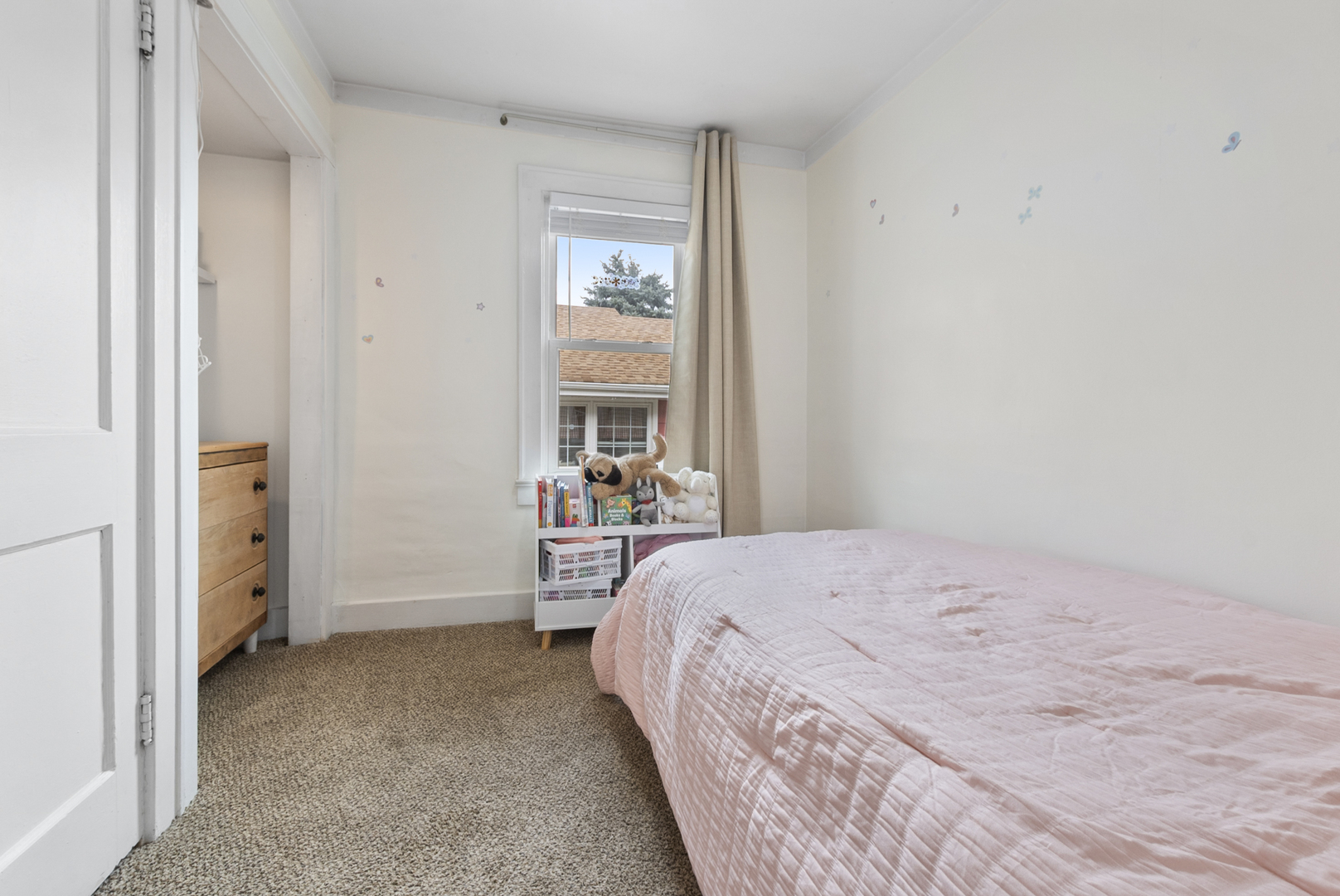 714 Walnut Street Lemont, IL 60439 - Photo 9 of 25 a bedroom with a bed and a window