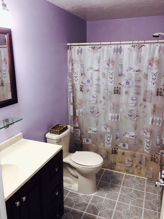 30 Standish Road, Unit 1 & 2 Bourne, MA 02562 - Photo 23 of 30 a bathroom with a toilet a sink and a shower