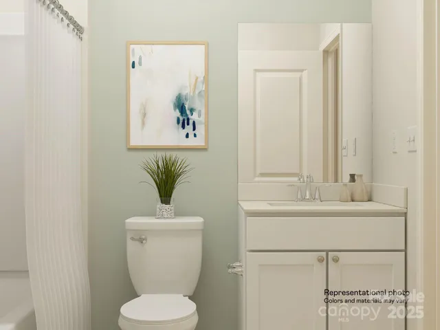 an aerial view of a house with outdoor space swimming pool