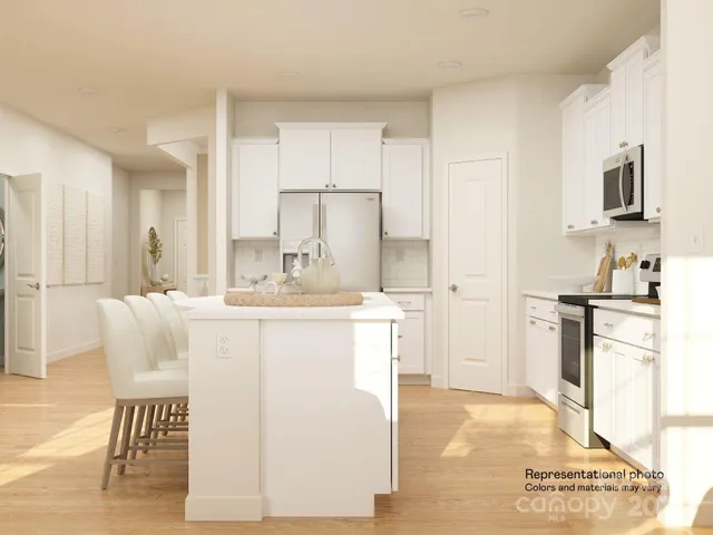a view of living room filled with furniture and window