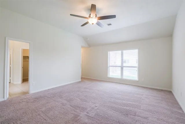 a white bath tub sitting next to a window