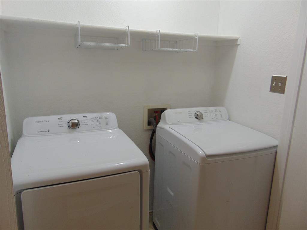 1425 Sunny Meadow Road Lancaster, TX 75134 - Photo 13 of 22 a utility room with dryer and washer