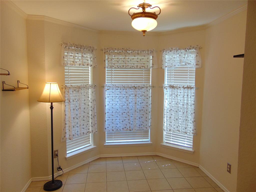 1425 Sunny Meadow Road Lancaster, TX 75134 - Photo 14 of 22 a view of an empty room with a window