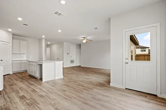 a view of kitchen with wooden floor