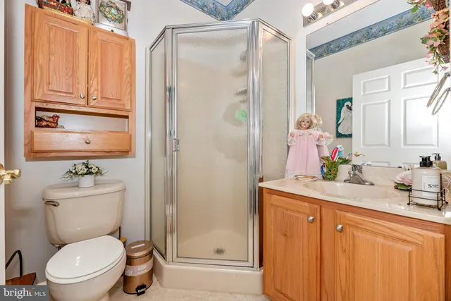 a bedroom with bed and a window