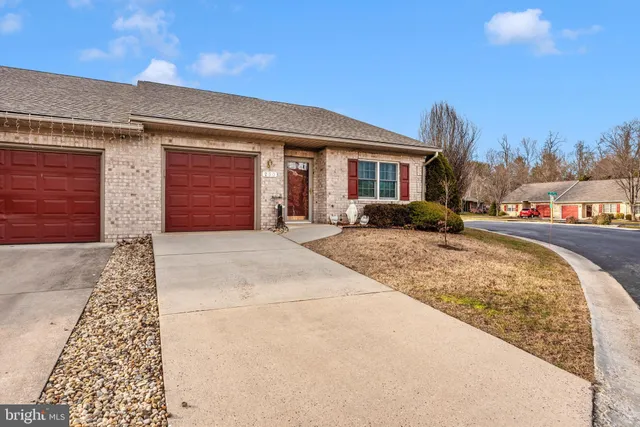 an aerial view of a house with a swimming pool