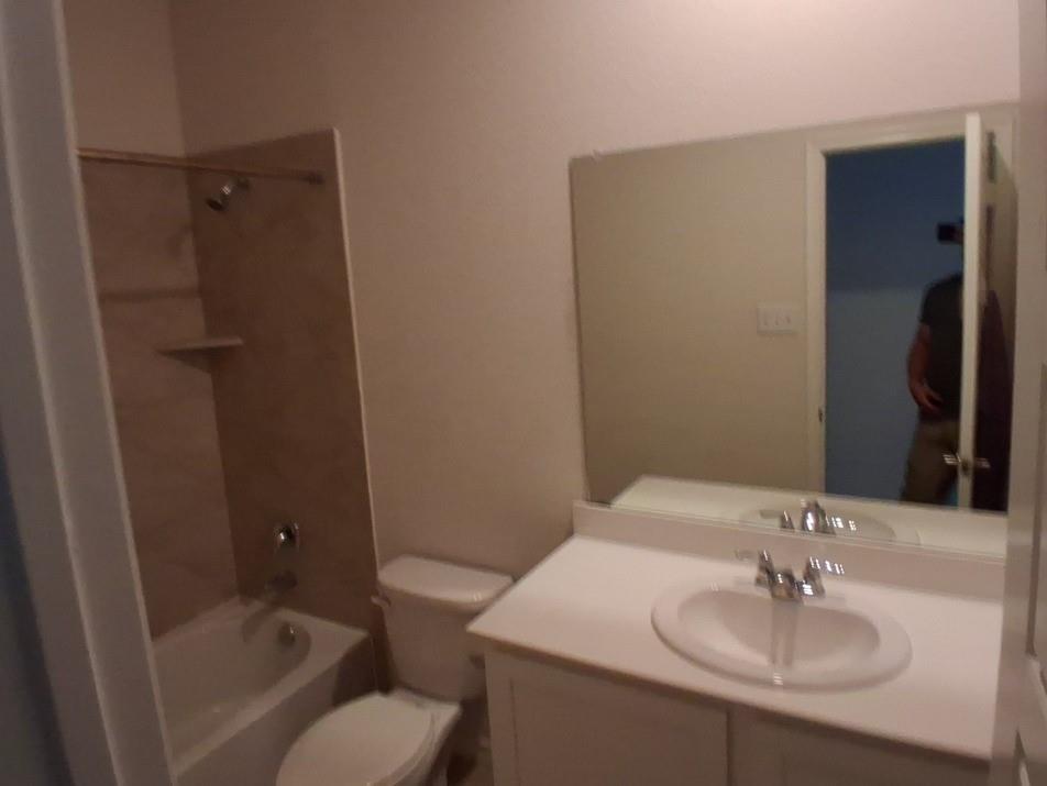 141 Colony Way Fate, TX 75189 - Photo 12 of 20 a bathroom with a sink toilet and shower