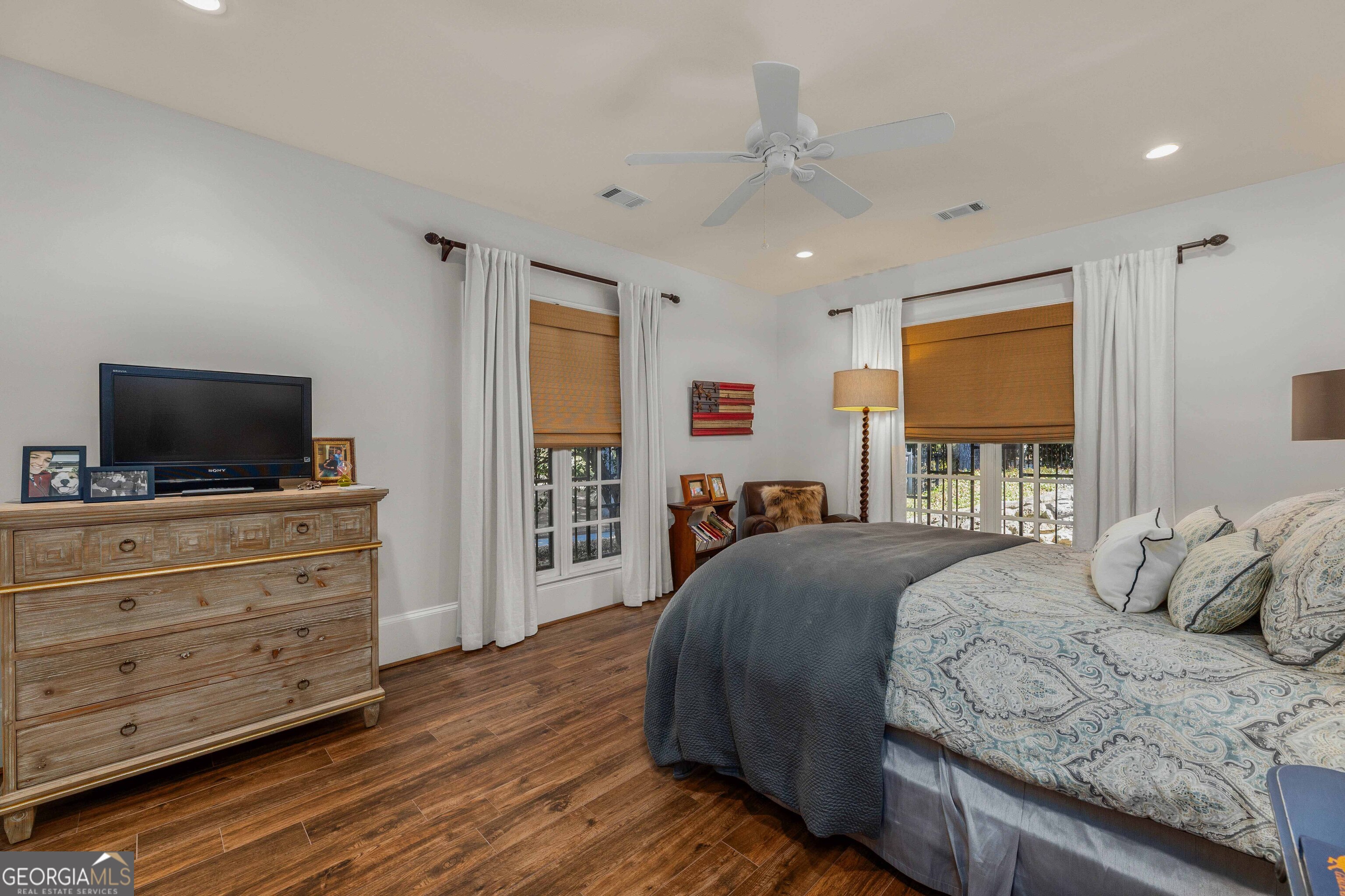 2000 Poplar Drive Columbus, GA 31906 - Photo 21 of 33 a bedroom with a bed and a flat screen tv
