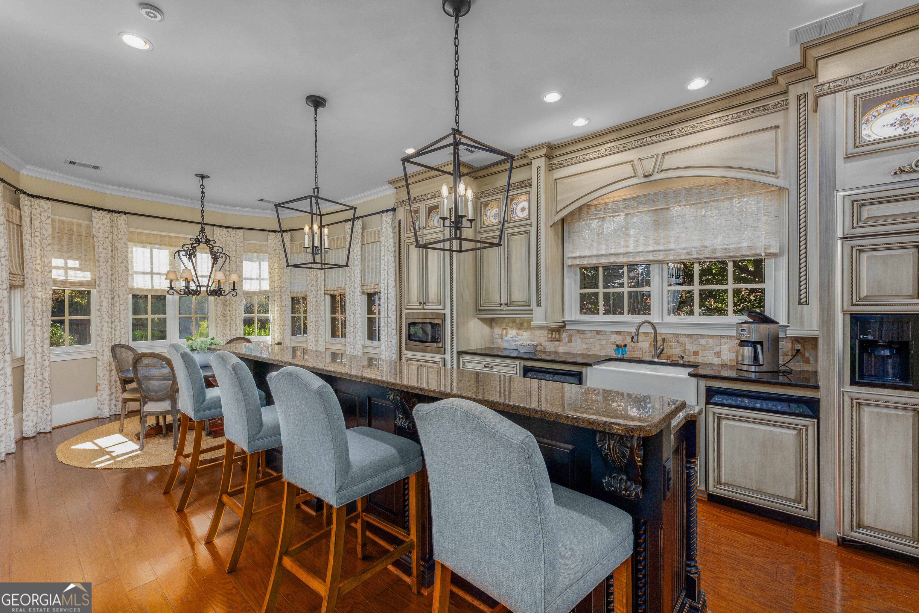 2000 Poplar Drive Columbus, GA 31906 - Photo 8 of 33 a dining table chairs and a chandelier