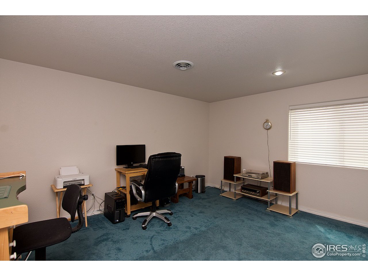 832 Nicole Road Sterling, CO 80751 - Photo 19 of 37 Garden Level Family Room
