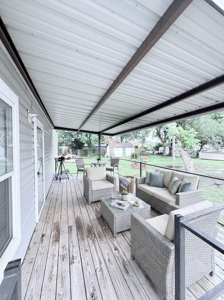106 North 3rd Street Highlands, TX 77562 - Photo 13 of 13 Porch virtual staged