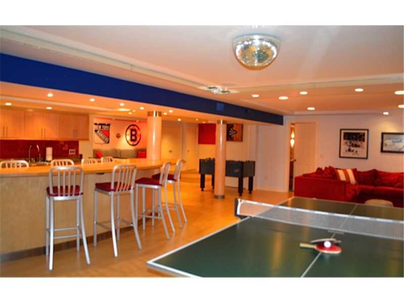 141 Brookside Road Darien, CT 06820 - Photo 17 of 26 a living room with stainless steel appliances dining table and chairs