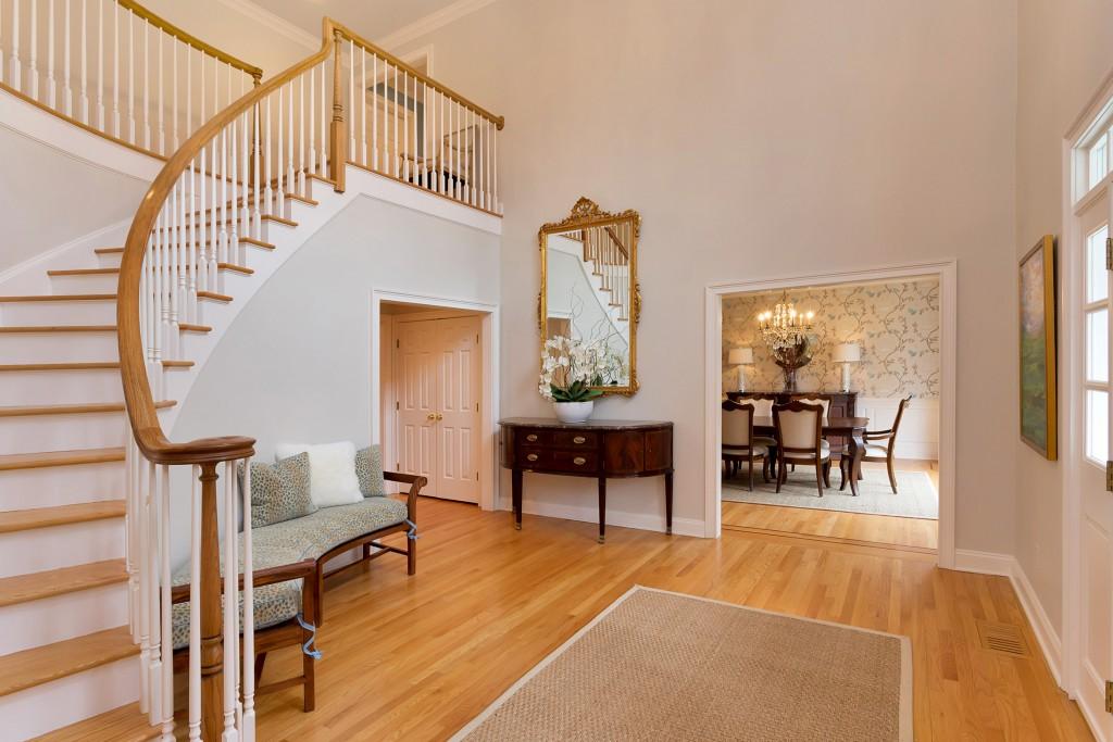141 Brookside Road Darien, CT 06820 - Photo 2 of 26 a view of a livingroom with furniture wooden floor and windows