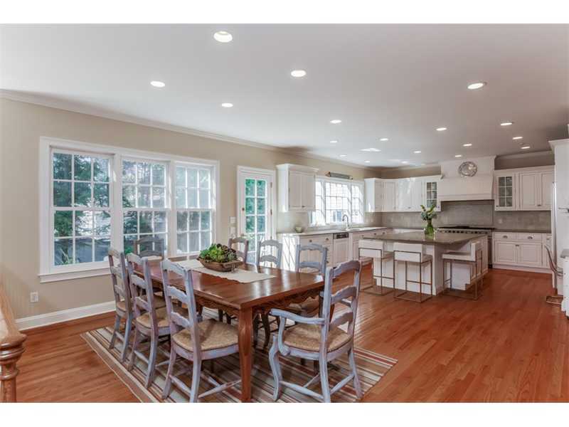 141 Brookside Road Darien, CT 06820 - Photo 24 of 26 a dining room with furniture and wooden floor