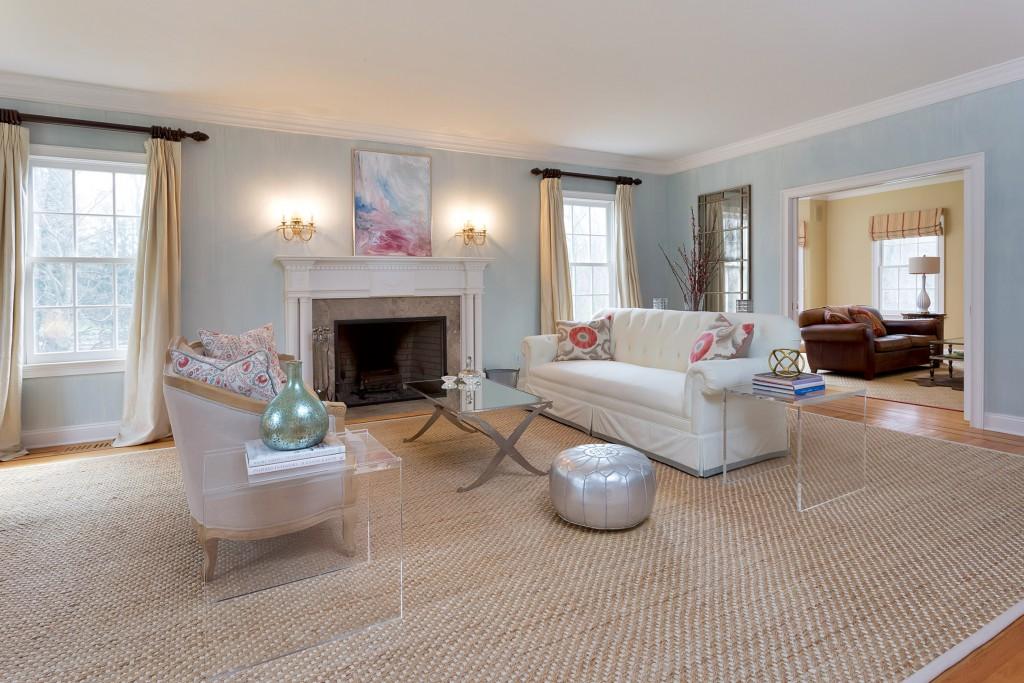 141 Brookside Road Darien, CT 06820 - Photo 3 of 26 a living room with furniture and a fireplace