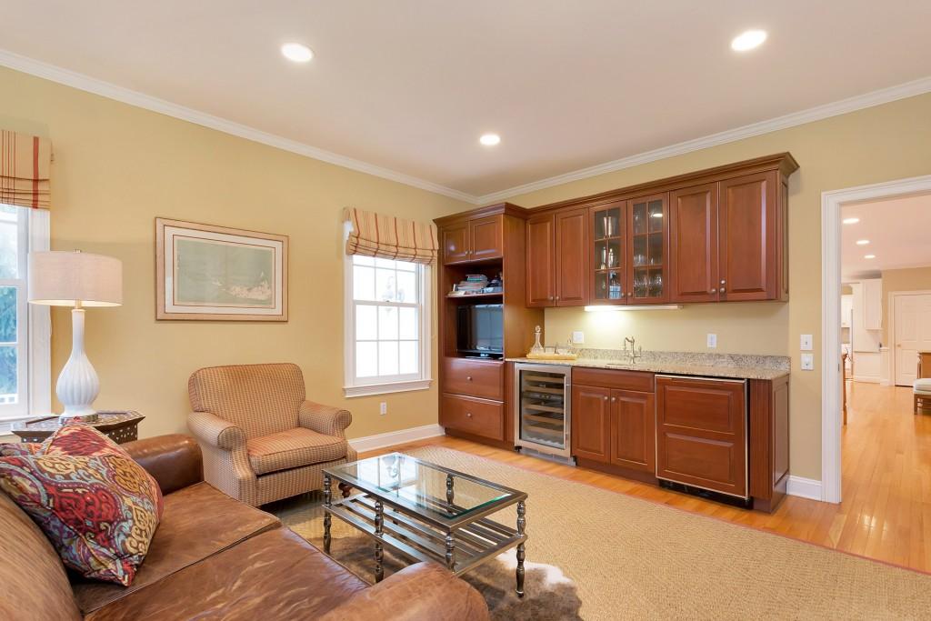 141 Brookside Road Darien, CT 06820 - Photo 4 of 26 a kitchen with granite countertop wooden cabinets and stainless steel appliances