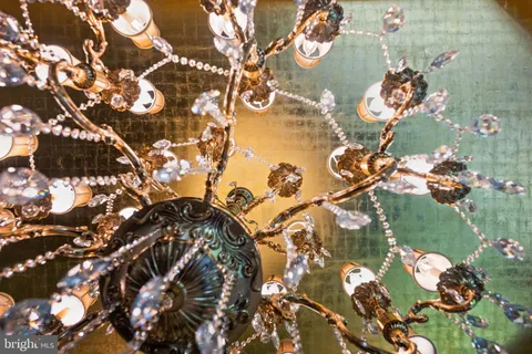 a bathroom with a sink and a shower curtain