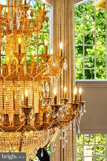 a view of a hallway with windows