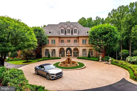a view of swimming pool with outdoor seating