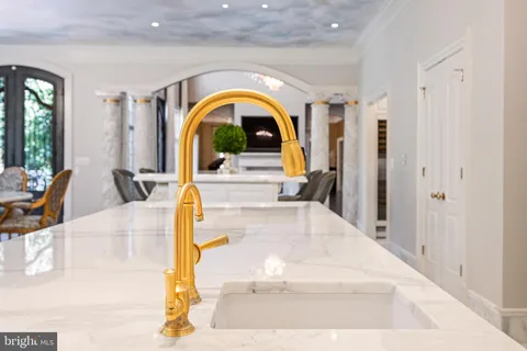 a view of a livingroom with wooden floor and a window