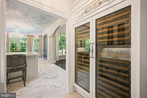 a living room with fireplace and a fireplace